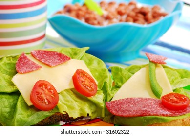 Spring Breakfast For Child With Funny Sandwich In Car Or Sailing Boat Shape