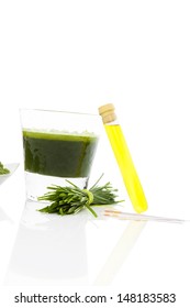 Spring cleaning. Detox. pH test strips, wheat grass and green juice. Natural herbal alternative medicine. Healthy lifestyle. 