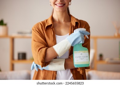 Spring cleaning, hands and bottle with chemical spray, eco friendly products and disinfection of bacteria, dirt and household maintenance. Closeup cleaner, cleaning service and liquid detergent soap
