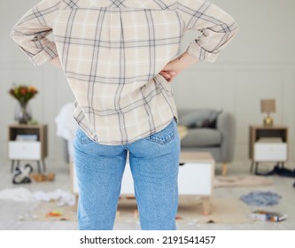 Spring Cleaning, Messy, Dirty Room With Woman Feeling Annoyed, Frustrated And Tired. Tidying And Arranging Untidy Living Room, Lounge And Home Space For Personal Hygiene Or After A Break In Or Theft