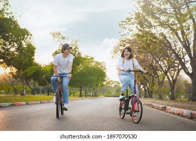 1,933 Couple Riding Bike Asian Images, Stock Photos & Vectors ...