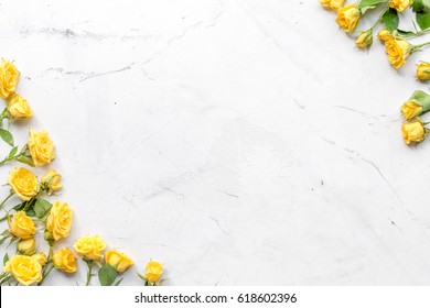 Spring Concept With Flowers On White Marble Table Background Top View Mockup