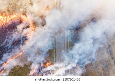 Spring Dry Grass Fire Next To A Busy Highway; Photo Taken From A Drone