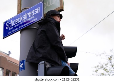 Spring Festival Named Sechseläuten With Spectator On Higher Ground On A Rainy Spring Day. Photo Taken April 24th, 2022, Zurich, Switzerland.