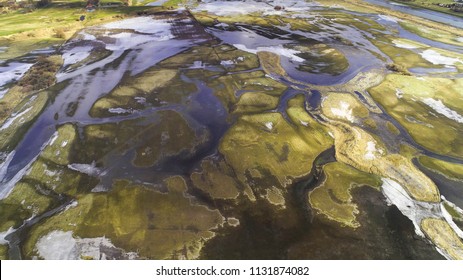 Spring fields and meadows during thaws from a bird's eye view