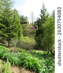 Spring foliage around stone chime tower