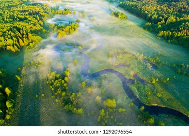 Spring Green Meadow From Above. Aerial Spring Landscape With River. Green Landscape Of Belarus. Sunny May Weather. Clean Environment.