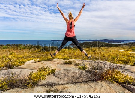 Spring has sprung. Jumping for joy and bushwalking along coastal headlands filled with flowering wildflowers