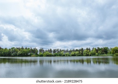 Spring Landscape Out Of Focus With Noise, Grain And Film Effect With Big Lake, Forest Trees, Pines And Willows With Clouds Before Rain, Tourism Concept, Countryside, Wallpaper And Cover
