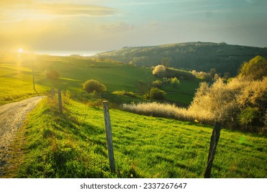 spring landscape rural lane sunset over countryside - Powered by Shutterstock