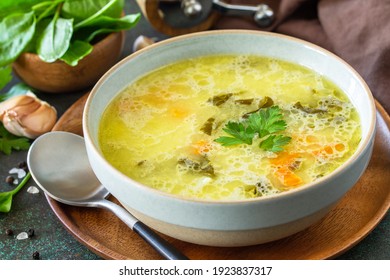 Spring Menu. Healthy Spinach Soup With Cream On A Dark Stone Countertop.