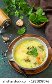 Spring Menu. Healthy Spinach Soup With Cream On A Dark Stone Countertop.