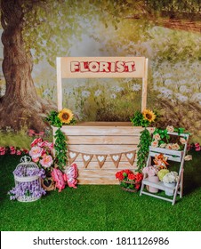 Spring mini photo session in a photo studio  with a florists stand