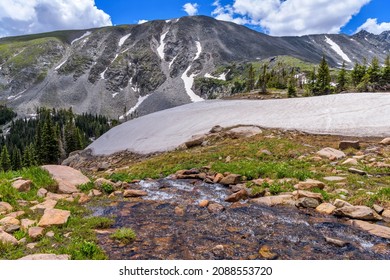 Spring Mountain Creek - A mountain creek running down from snow covered mountain top. Pawnee Pass Trail. Indian Peaks Wilderness, Colorado, USA. - Shutterstock ID 2088553720
