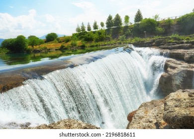 Spring Niagara Waterfall In Montenegro With Fast Water Stream And Green Plants. Wild Nature Backgrounds