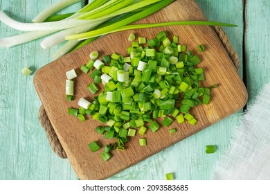 spring onion sliced for salad or seasoning on wooden surface - Powered by Shutterstock