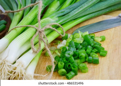 Spring onions are rich in vitamins,minerals and natural compound.
Green onions or Spring onions on wooden board cutting. - Powered by Shutterstock