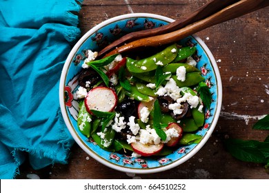 Spring Radish And Snap Pea Greek Salad.style Rustic.selective Focus