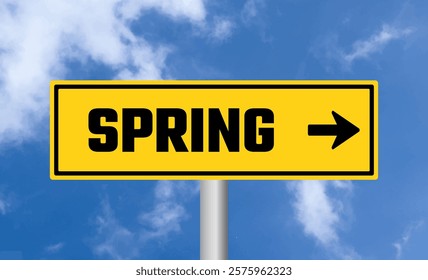 Spring road sign on cloudy sky background