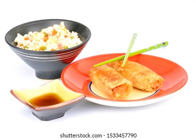 Spring Rolls With Cantonese Rice And A Ramekin Of Soy Sauce