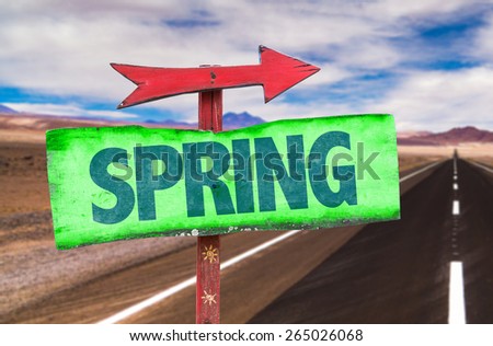 Spring sign with road background