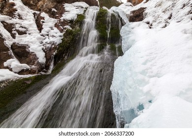 Spring, Snow On The Banks Of A Mountain River, Forest And Mountains, Snow Melting.