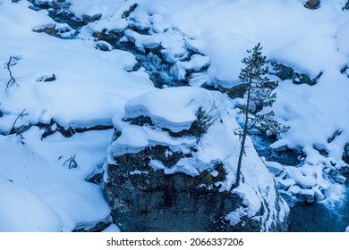 Spring, Snow On The Banks Of A Mountain River, Forest And Mountains, Snow Melting.