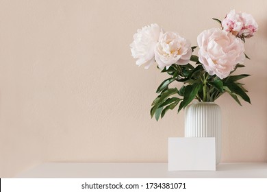 Spring, Summer Floral Still Life. Pink Peony Flowers Bouquet In Porcelain Vase On White Wooden Table. Blank Greeting Card Mockup Scene. Nude Wall Backround. Empty Copy Psace, No People, Front View.