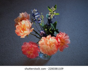 Spring Sun Shining On Cottage Peony (Paeonia Officinalis) And Alpine Delphinium (Delphinium Elatum) Bouquet.