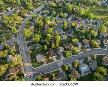 Spring Sunrise Over Residential Area Of Fort Collins In Northern Colorado With Streets After Asphalt Crack Sealing