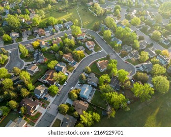 Spring Sunrise Over Residential Area Of Fort Collins In Northern Colorado With Streets After Asphalt Crack Sealing, Aerial View