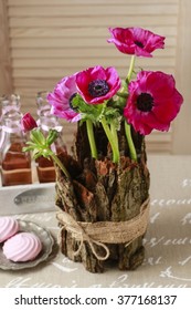 Spring Table Decoration With Bark And Anemone Flowers