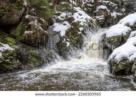 Spring thaw. Water rapids in the spring season when ice and snow melt.