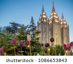 Spring tulips outside Salt Lake Temple in early evening. The Church of Jesus Christ of Latter-day Saints, Temple Square, Salt Lake City, Utah, USA.