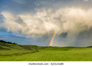 Spring Weather, Storm And Sunset Over The Meadows Of Tuscany.