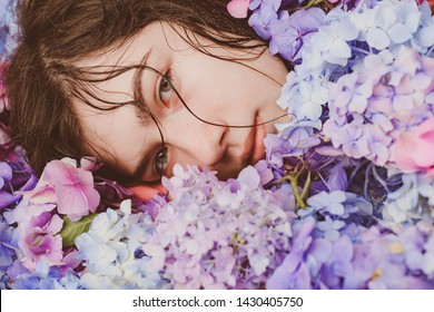 Spring Woman With Hydrangea Flowers. Makeup Cosmetics And Skincare. Summer Beauty. Fashion Portrait Of Woman. Healthy Hair And Skin. Girl With Summer Makeup. Hot Day.