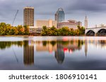 Springfield, Massachusetts, USA downtown skyline on the river at dusk in early autumn.