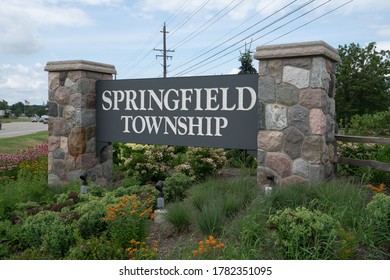 Springfield Township, MI  /  USA - 07/22/2020 : Town sign on a bright summer day