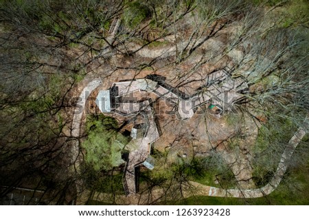 Springtime in the Treehouse - looking down from the air via drone at the handicap accessible treehouse in the woods in the spring at a local park in Beavercreek, OH.