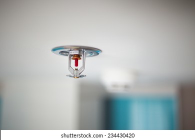 Sprinkler and smoke detector - Shutterstock ID 234430420