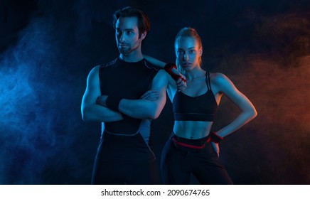 Sprinter run. Strong athletic woman and man running on black background wearing in the sportswear. Fitness and sport motivation. Runner concept. - Shutterstock ID 2090674765