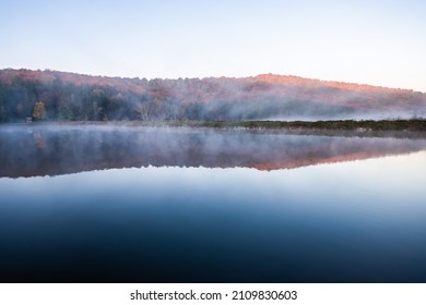 Spruce Knob Lake Hiking Trail In Appalachian West Virginia Mountains Fall Autumn Season And Fog Mist Sunrise Morning In Monongahela National Forest Sunlight On Trees Foliage