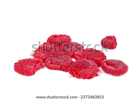 Sqeezed raspberry isolated on white background