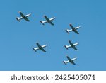 A squadron of fighter planes from World War II