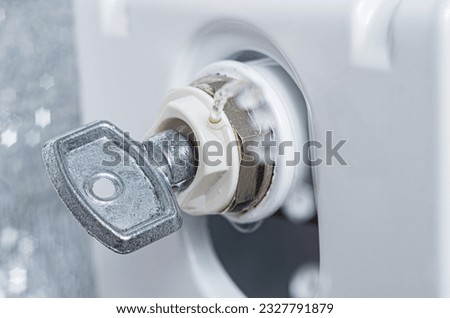 Square 5 mm key for radiator bleed valve.