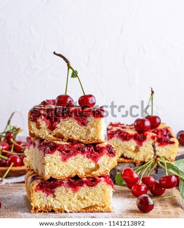 slices of a pie with cherries