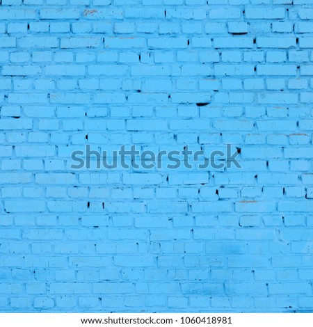 Square brick block wall background and texture. Painted in blue