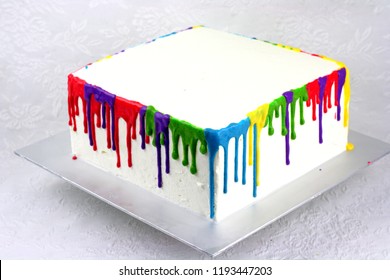 Square Cake With Rainbow Color Dripping