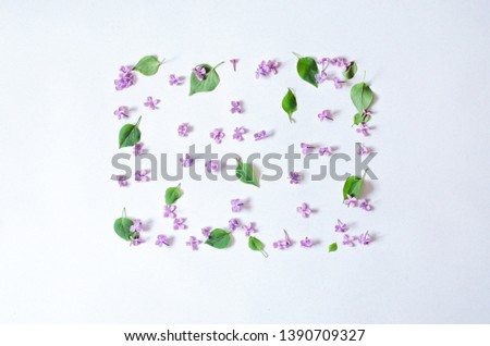 The square is created on a white background of lilac and green sheets.