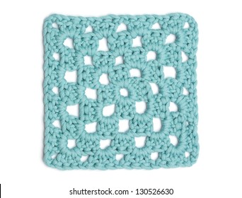 Square Of Crochet Doily In Light Blue Wool.